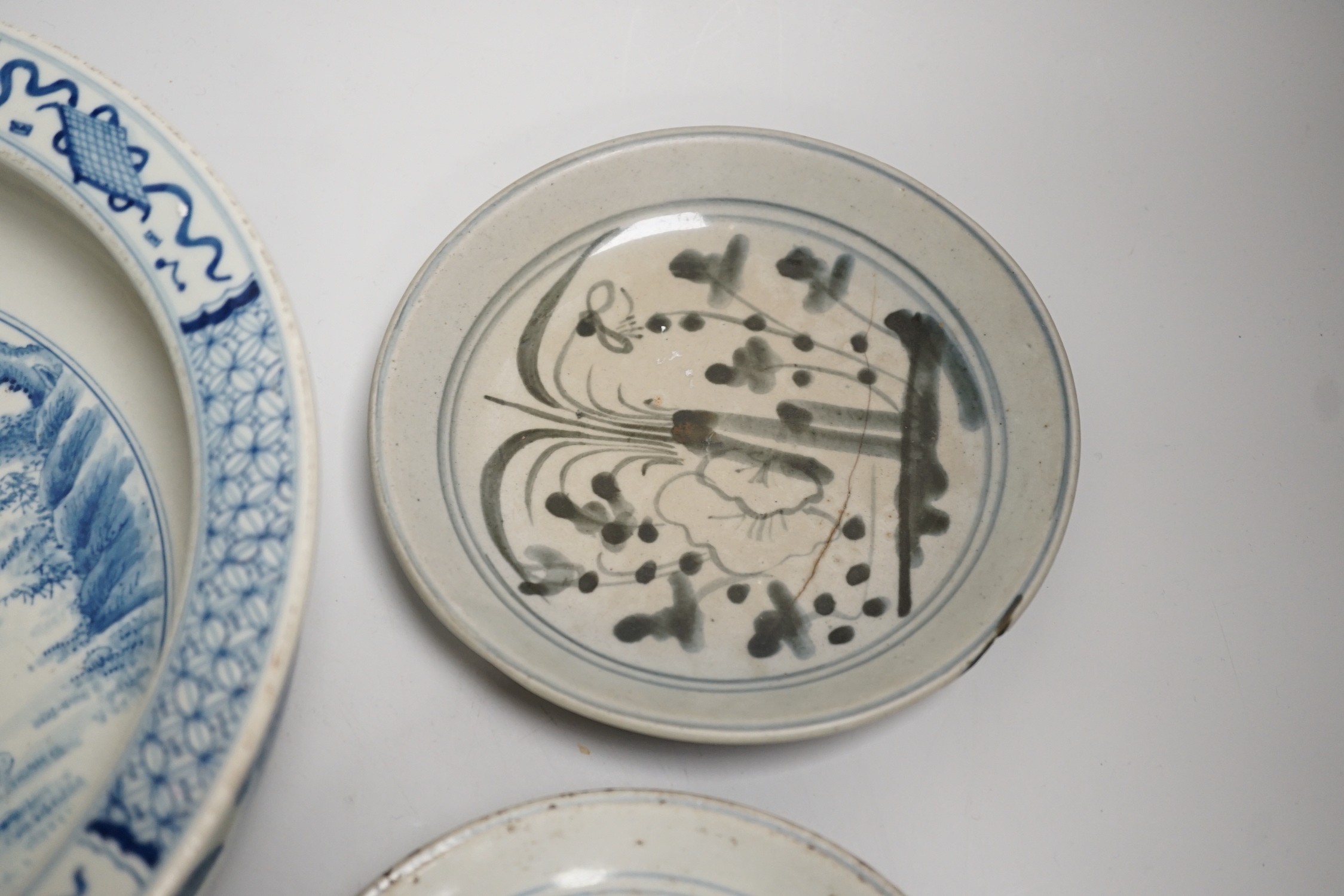 A Chinese blue and white bowl, tea bowl and saucer, and two other dishes, largest 29cm diameter